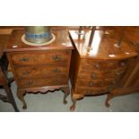 An early 20th century walnut bowfront chest of four short drawers on cabriole supports, together