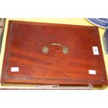 A mahogany rectangular box with brass handle, the lid and interior metal lined, possibly a flower