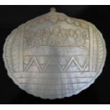 A carved, mother-of-pearl shell depicting 'The Last Supper', 13.5cm wide
