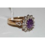 A 9ct gold, amethyst and diamond chip flower cluster ring, ring size 'P', gross weight 3.5 grams