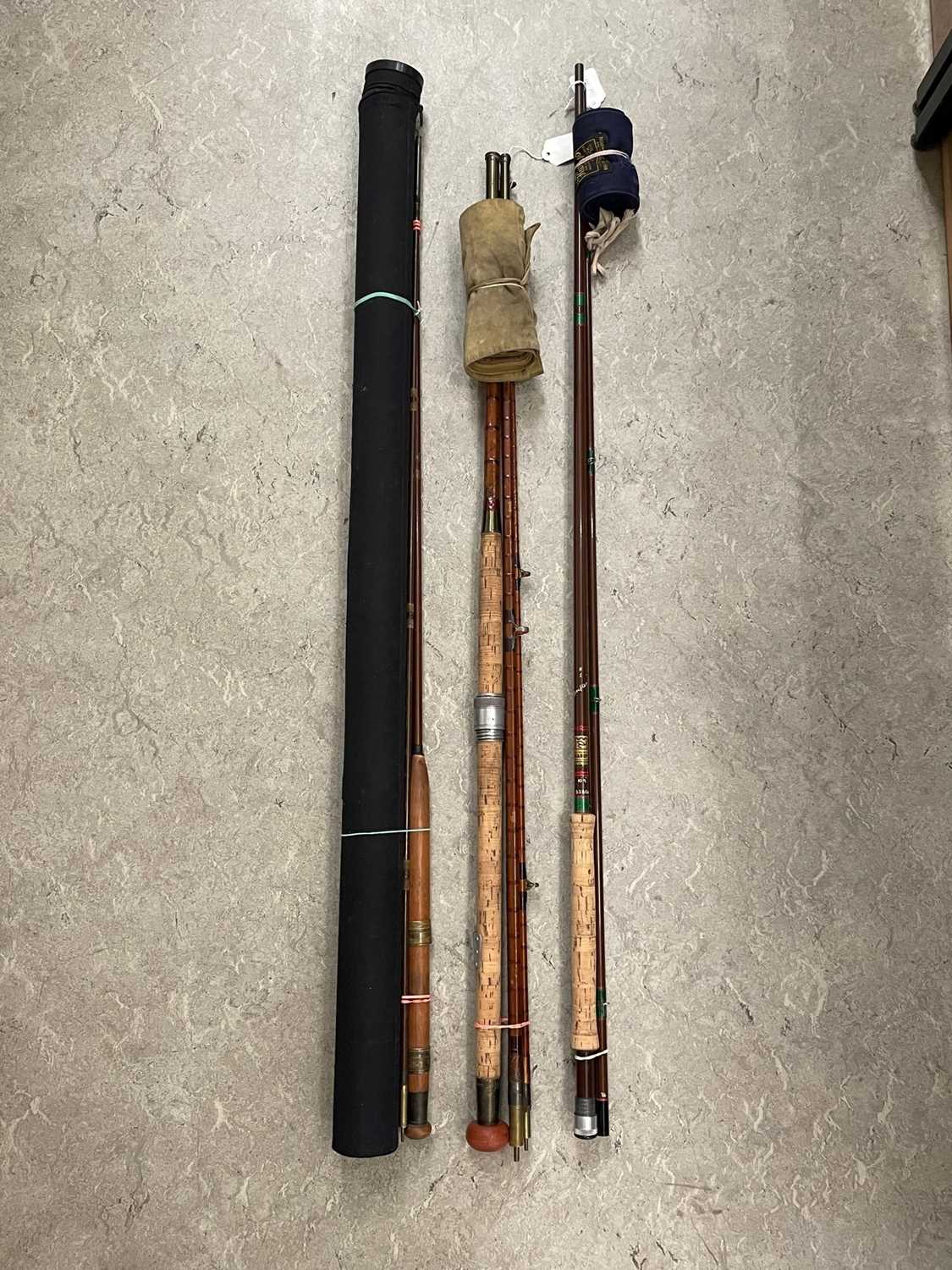 A group of three fishing rods to include Hardy's Greenheart rod, ref no.2A43453, Hardy's Palakona (