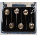 A cased set of six Birmingham silver coffee spoons with bean terminals