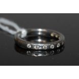 A platinum and diamond ten stone ring, stamped marks '950', ring size 'L', gross weight 4.7 grams