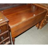 A 19th century mahogany drop-leaf table with single end drawer on tapered cylindrical supports