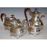 A George VI silver four-piece silver tea set, Birmingham, 1937 and later, makers mark of 'S Ltd',