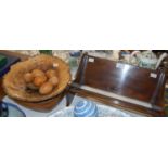 A group of assorted treen items to include a mahogany bookrest, a burr formed bowl, six carved
