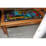 A mid-century tile-top coffee table, together with another similar smaller coffee table
