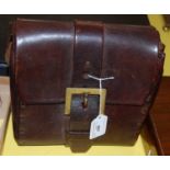 A vintage leather satchel/ cartridge bag