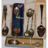 A collection of seven assorted silver commemorative and other teaspoons