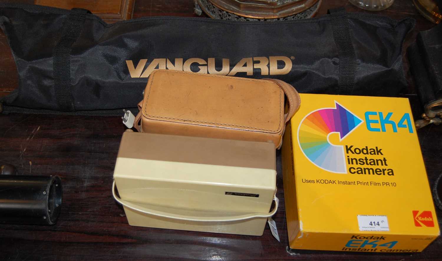 A mixed lot of digital equipment comprising a Kodak instant camera model EK4, a Vanguard tripod in