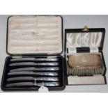 A cased Birmingham silver-backed gents hairbrush and a cased set of six silver handled fruit knives