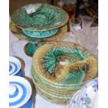 A group of eleven Majolica Begonia pattern plates and matching comport, the plates with impressed