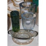 A group of a glassware to include two similar mid-century glass vases, a green art glass vase, a