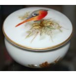 A Royal Worcester hand-painted porcelain circular dressing table box and cover, the cover painted