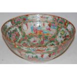 A Chinese porcelain famille rose Canton punch bowl, Qing Dynasty, 25.5cm diameter x 10cm high