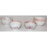 A Regency English porcelain tea bowl decorated with pink and red rose garland detail on the outer