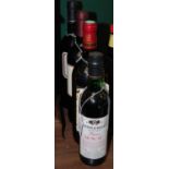 Four assorted bottles of wine comprising one bottle of Monsparone Barbera D'Asti 2003, one bottle of