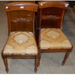 A pair of 20th century Regency style dining chairs