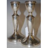 A pair of Birmingham silver candlesticks, 14.5cm high