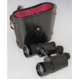 A vintage cased set of Tecnar by Swift Coated Optics binoculars, 10x50 No.86555