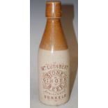 A Buchan of Portobello stoneware ginger beer bottle for 'Wm. Cuthbert, Springwells, Dunkeld', 21cm