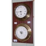 A Metamec wall mounted clock and barometer