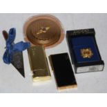 Box of assorted items to include a vintage Zippo lighter for the United States Coastguard, a vintage