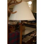 An Art Deco style oak octagonal standard lamp and shade