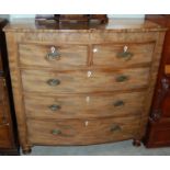 A 19th century mahogany bowfront chest of drawers, a central hidden single short frieze drawer above