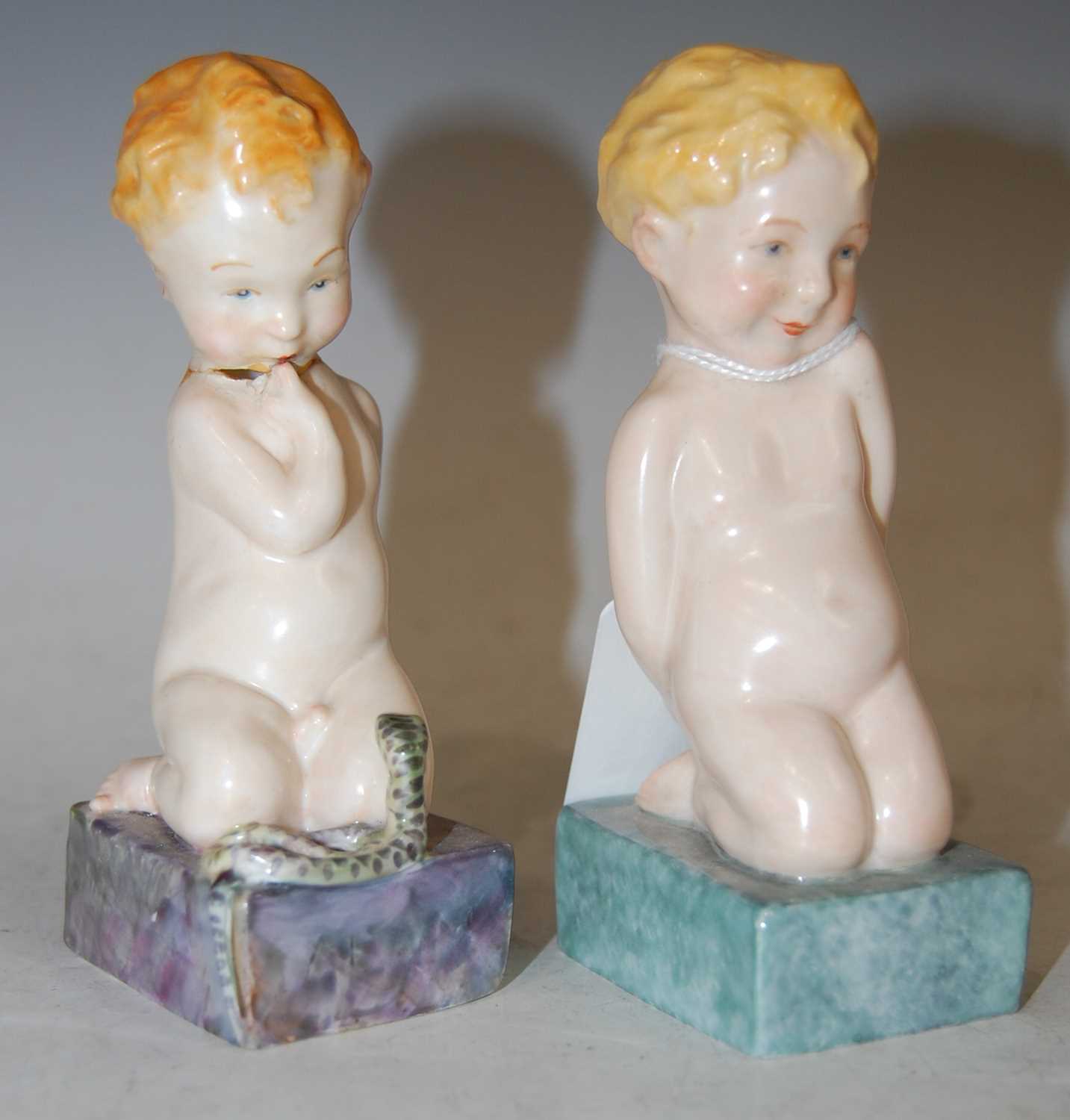 A pair of Royal Crown Derby 'Adam and Eve' figures, 12cm high