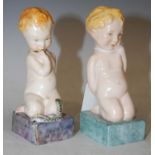 A pair of Royal Crown Derby 'Adam and Eve' figures, 12cm high