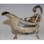 A George III silver sauce boat, London, probably 1775, makers mark of 'TE', with foliate scroll