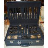 A Suissine canteen of cutlery enclosed within navy carry case