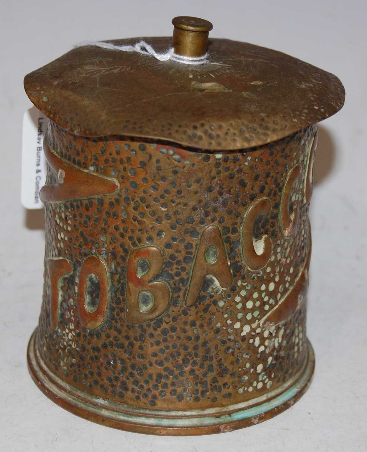 WWI interest: a Trench Art shell case converted to a tobacco box and cover, the base stamped with