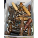 A collection of assorted vintage and other corkscrews