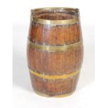 A brass bound oak barrel stick stand,