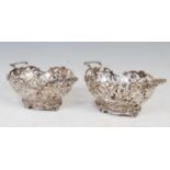 A pair of late 19th century Dutch silver twin handled oval shaped baskets,