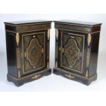 A pair of late 19th century 'Boulle' ebonised and gilt metal mounted pier cabinets,