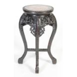 A Chinese dark wood urn stand, Qing Dynasty,