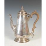 A George II silver coffee pot, London, 1751, makers mark obscured, possibly T.H for Thomas Heming,