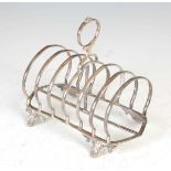 A Victorian silver seven bar toast rack, London, 1856, makers mark of CTF. over GF.,