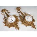 A late 19th / early 20th century French gilt metal clock and barometer set,