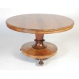 A 19th century rosewood snap-top supper table,