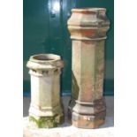 Two Victorian octagonal-shaped chimney pots,