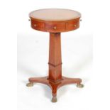 A George III style mahogany and boxwood lined drum shaped occasional table,