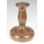 An Arts & Crafts riveted copper bottle vase,