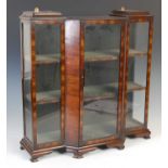 An early 20th century apprentice made mahogany Art Deco style breakfront display cabinet,