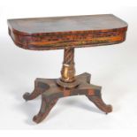 An unusual 19th century polychrome decorated calamander pedestal games table,