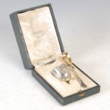 An early 20th century French silver gilt egg cup and spoon,