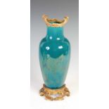 A late 19th/ early 20th century ormolu mounted green monochrome glazed ceramic vase,